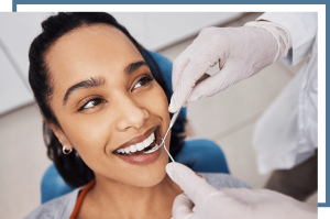 woman visiting our Frisco dentist